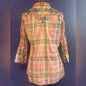 Roar button down, 3/4 length sleeves, with rhinestones. Size medium.